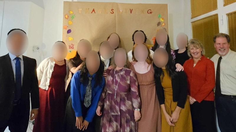 With coworkers at our 2025 Thanksgiving Party With coworkers at our 2025 Thanksgiving Party